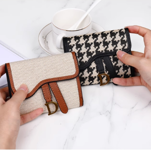 Ladies retro three-fold long wallet with gold D-buckle and large card capacity in [Insert Color] on white background.