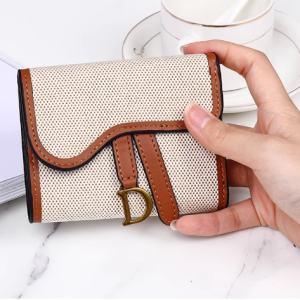 Ladies retro three-fold short wallet with gold D-buckle and large card capacity in [Insert Color] on white background.