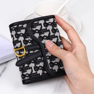 Ladies retro three-fold short wallet with gold D-buckle and large card capacity in [Insert Color] on white background.