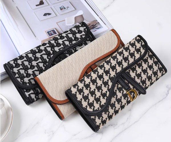 Ladies retro three-fold long wallet with gold D-buckle and large card capacity in [Insert Color] on white background.