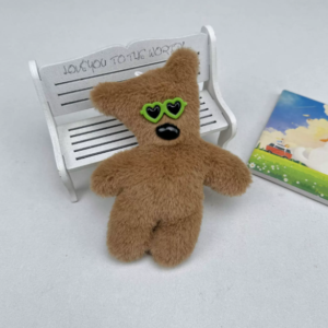 A collection of classic brown plush teddy bear keychains in various quirky styles attached to a bag.